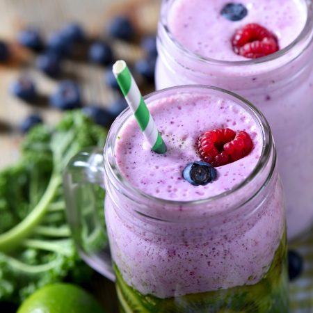 Smoothie with berries and kiwi, healthy drink, detox, diet or vegan food concept, fresh vitamins