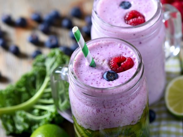 Smoothie with berries and kiwi, healthy drink, detox, diet or vegan food concept, fresh vitamins